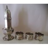 Silver collectables: to include a caster and three napkins ring  mixed marks