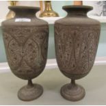 A pair of mid 20thC Asian cast metal pedestal vases, decorated with stylised animals  12"h