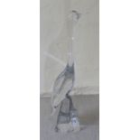 A Daum clear glass model, a heron, on a rock effect plinth  18"h