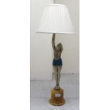 An Art Deco inspired painted cast metal table lamp, fashioned as a scantily clad woman, on an onyx