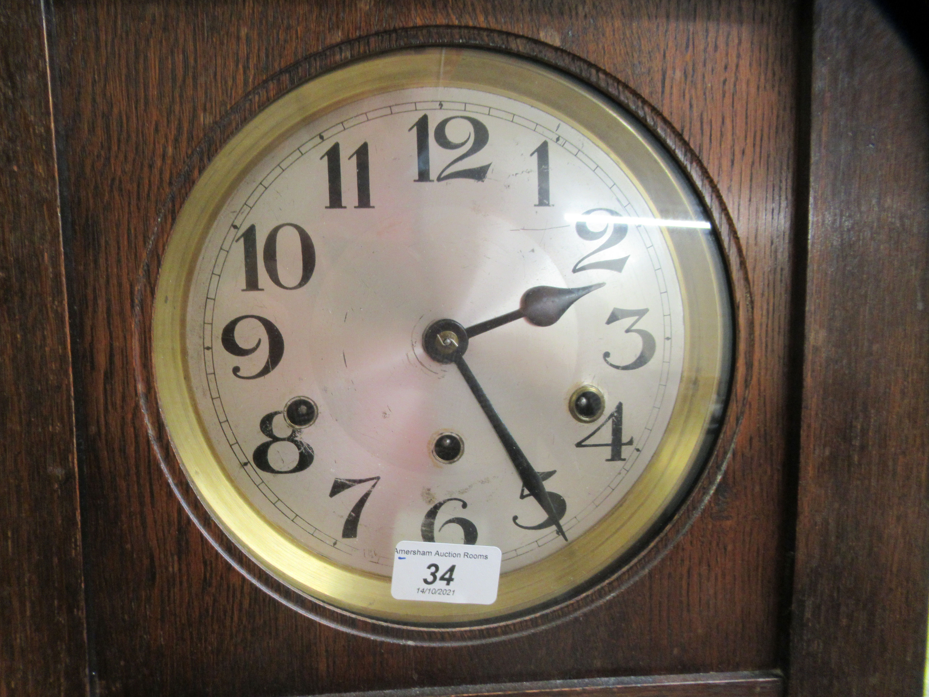 An early/mid 20thC oak cased granddaughter clock, the chiming movement faced by a brushed steel - Image 2 of 6