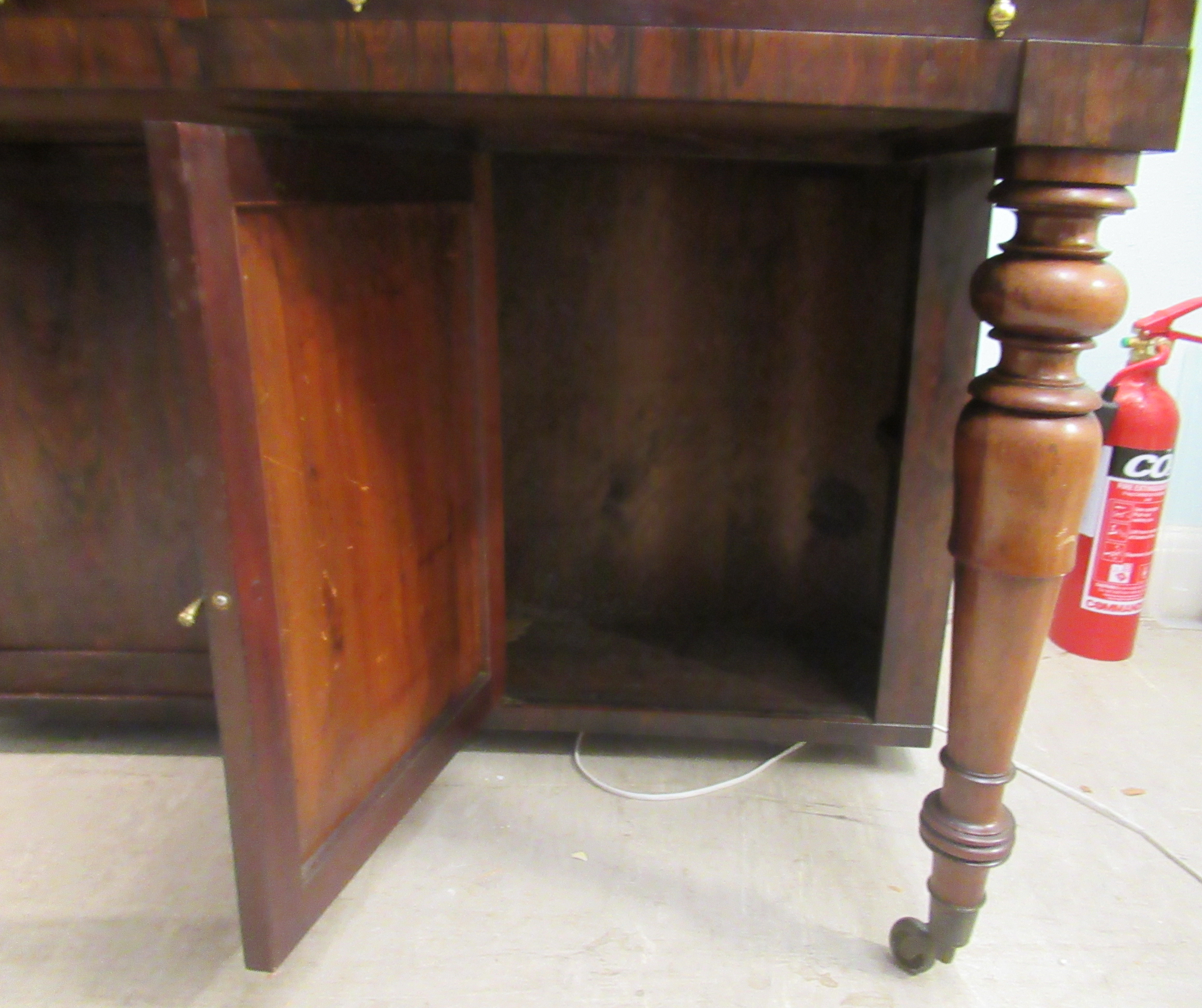 A William IV rosewood two part cabinet with a carved, bead bordered, breakfront cornice, over a pair - Image 5 of 9