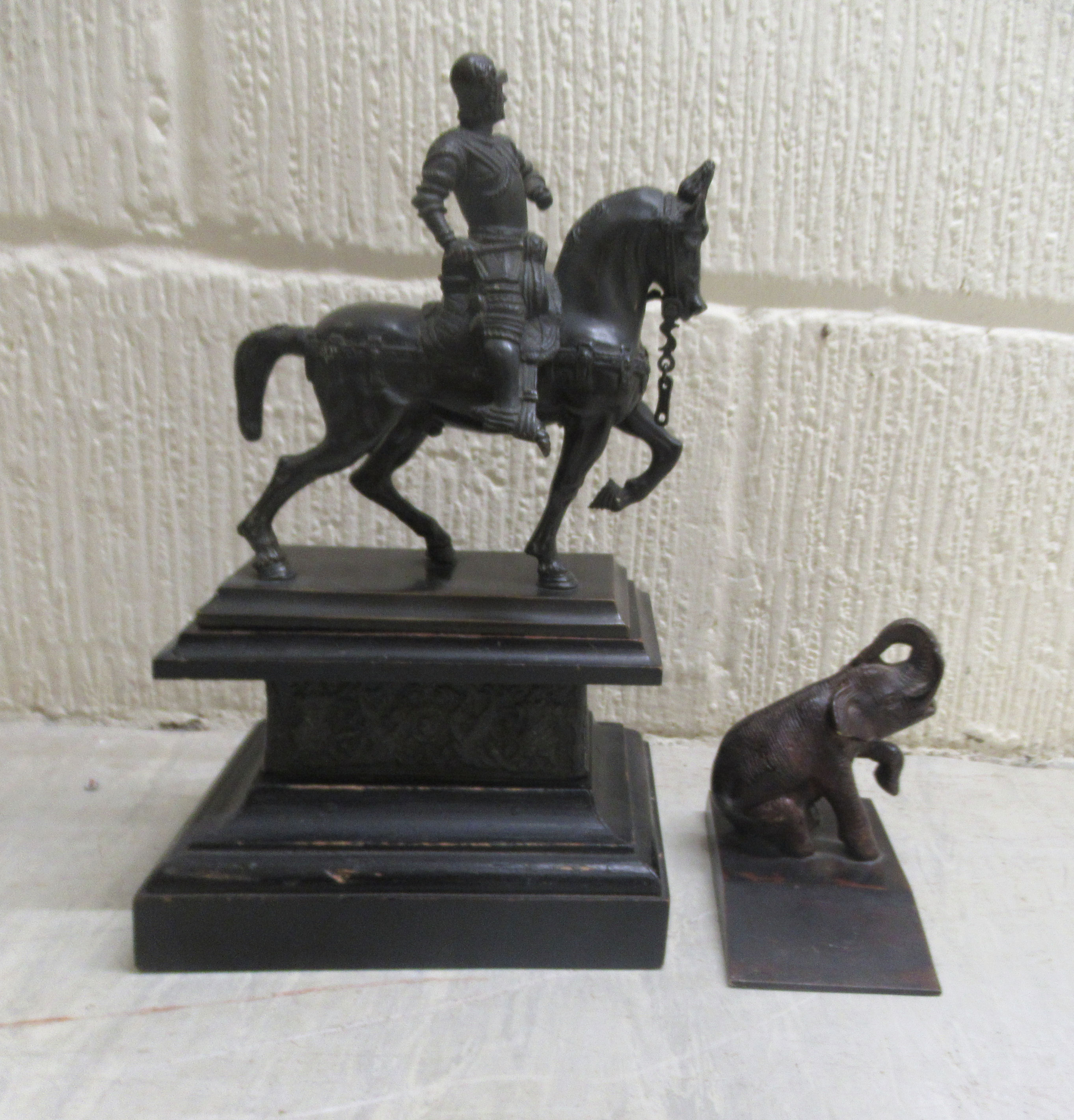 Four cast bronze figures, viz. a standing silvered and part gilded Spanish solider, on a plinth - Image 2 of 5