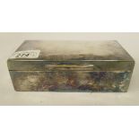 A silver cigarette box with straight sides and a hinged lid  London 1910  6.5"w
