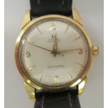 An Omega Automatic Seamaster 18ct gold cased wristwatch, faced by a baton dial