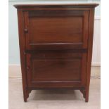 An Edwardian string and ebony inlaid mahogany twin door, bedside cabinet raised on bracket feet