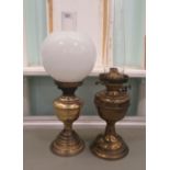 Two similar brass/copper oil lamps  20" & 23"h overall