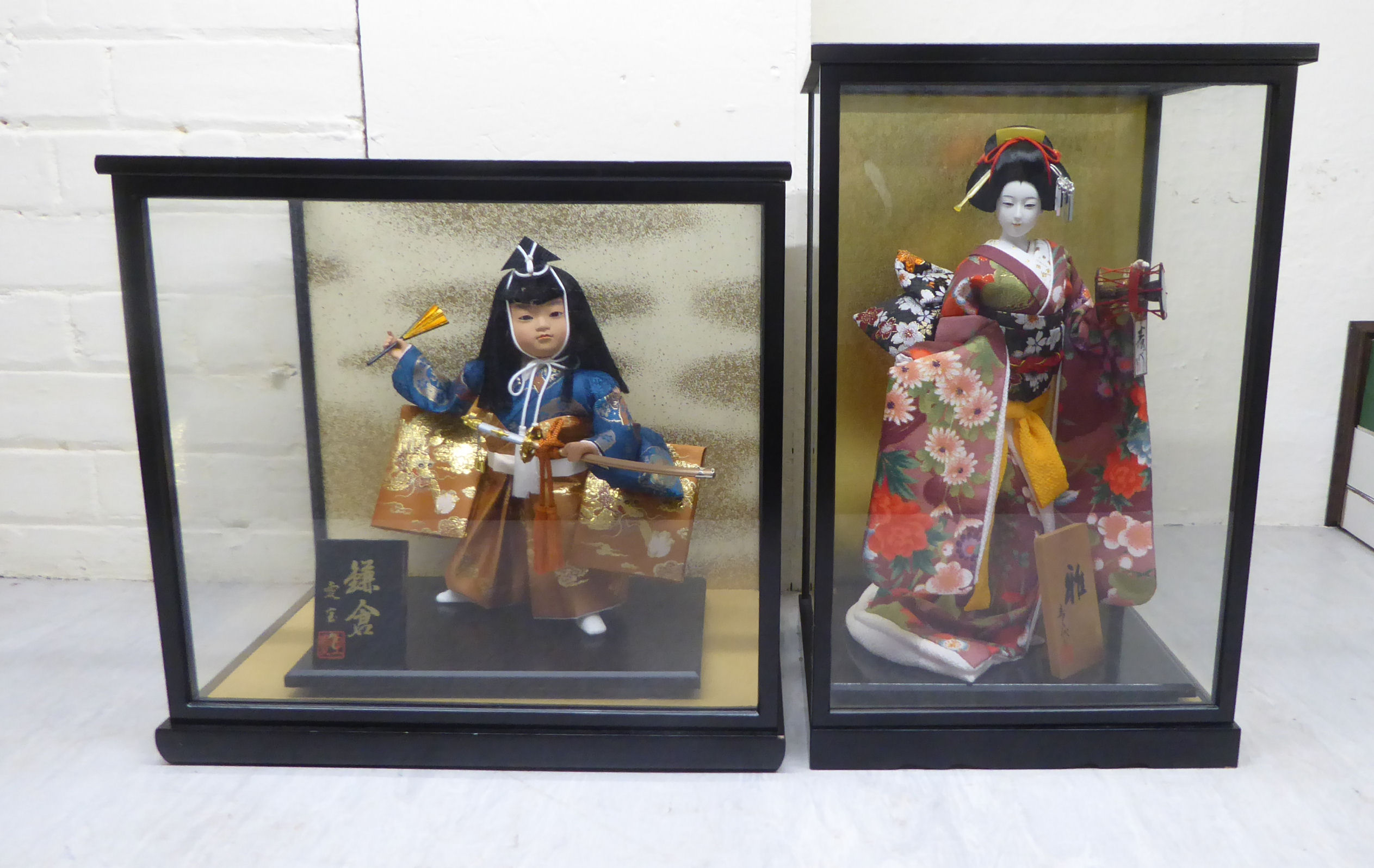 Two modern Japanese figures, wearing traditional fabric robes  12"h in partially glazed display