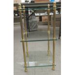 A modern three tier plate glass and lacquered brass stand  23"h  13"sq