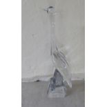 A Daum clear glass model, a heron, on a rock effect plinth  18"h