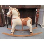 An ELF Toys Ltd of Braintree, Essex fabric rocking horse, on a stepped beech frame  26"h