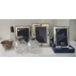 Silver collectables, viz. three photograph frames  largest 7" x 5.5"; three scent bottles; and a