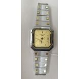 A ladies Longines stainless steel quartz bracelet watch, faced by a baton dial