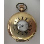 A Waltham of USA gold plated cased half hunter pocket watch, faced by a Roman dial with subsidiary