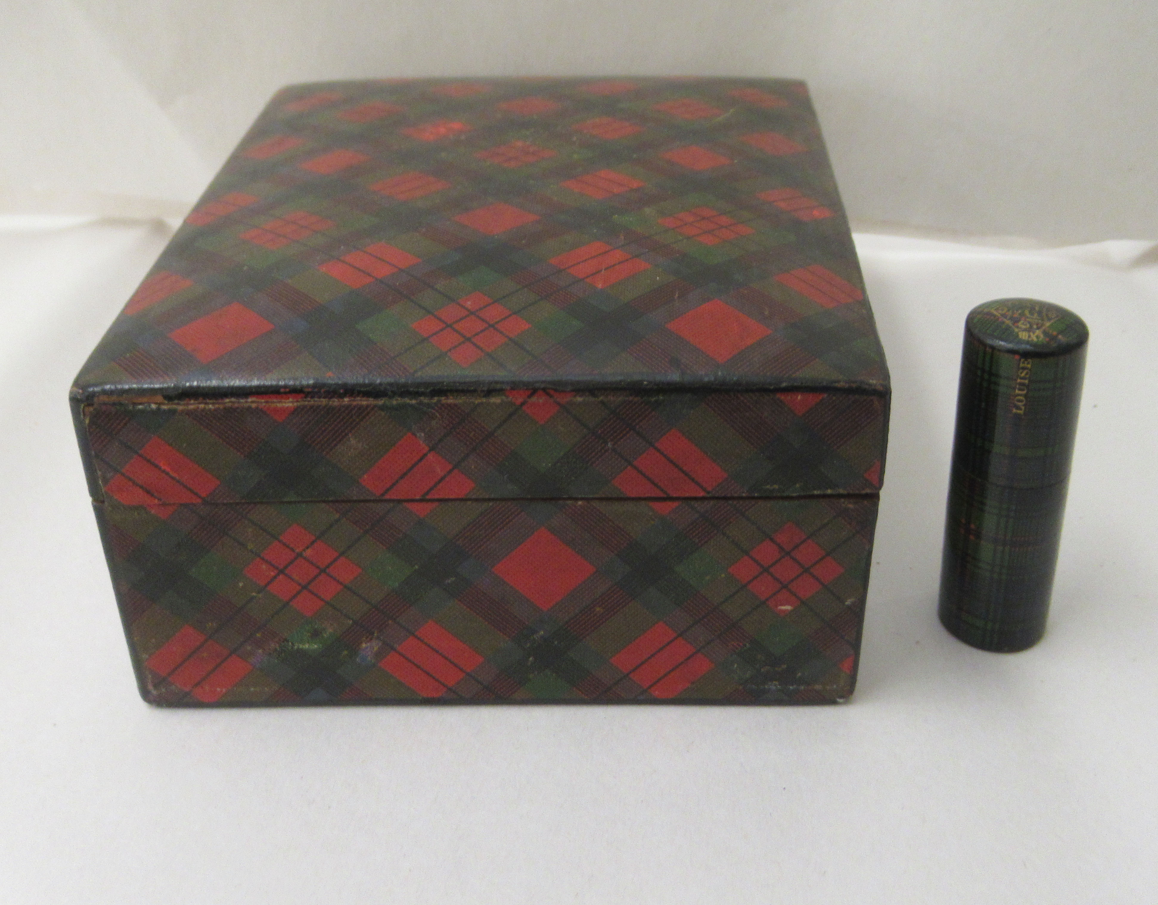 A late 19thC McDuff tartanware box of trapezium form with a hinged lid  6"w; and a Black Watch