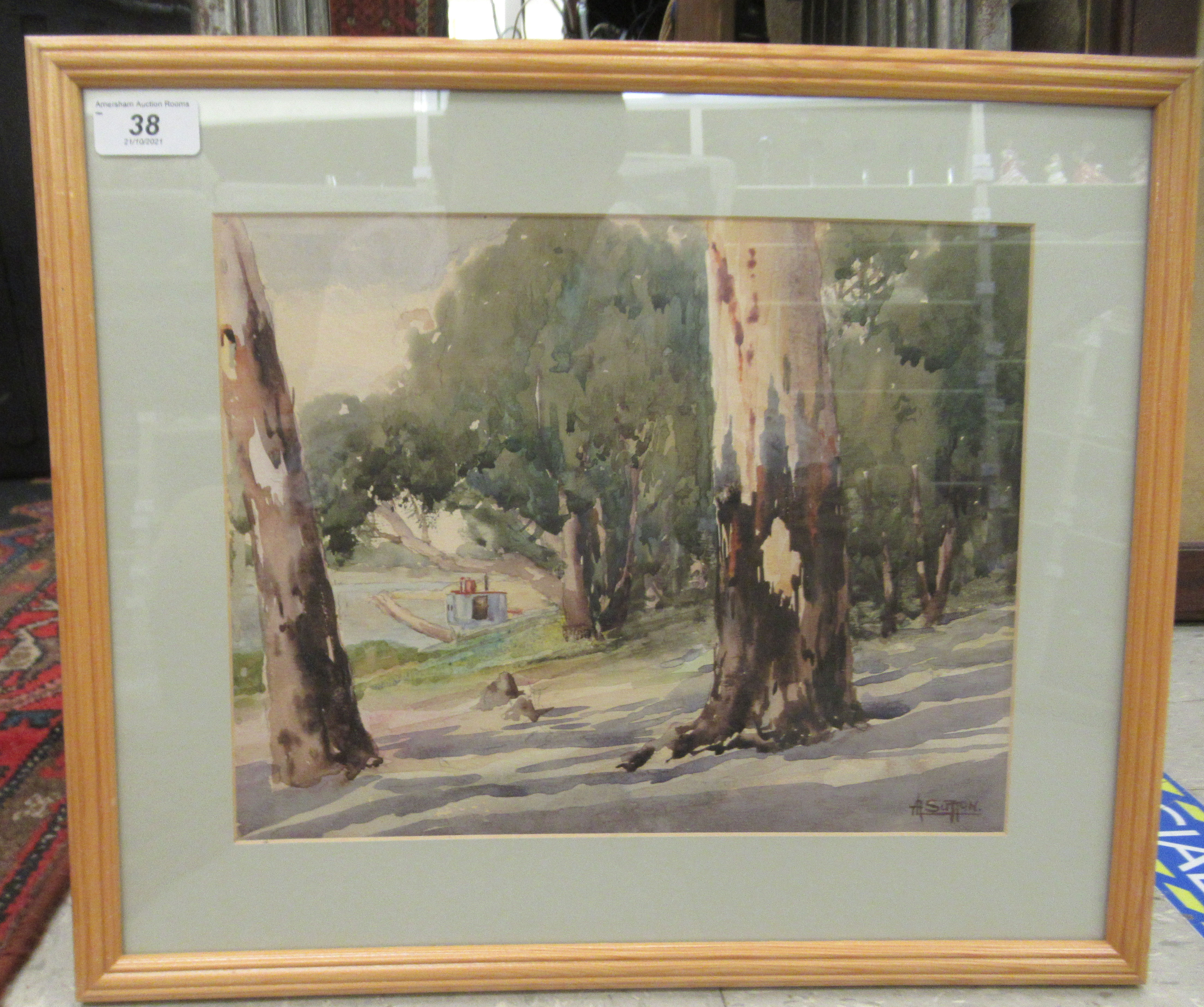 A Leslie Sutton - 'Gum Trees near the Murray River, Australia'  watercolour  bears a signature &