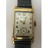 A 1930s Art Deco Bulova 10ct gold cased wristwatch, the 21 jewel movement, faced by an Arabic