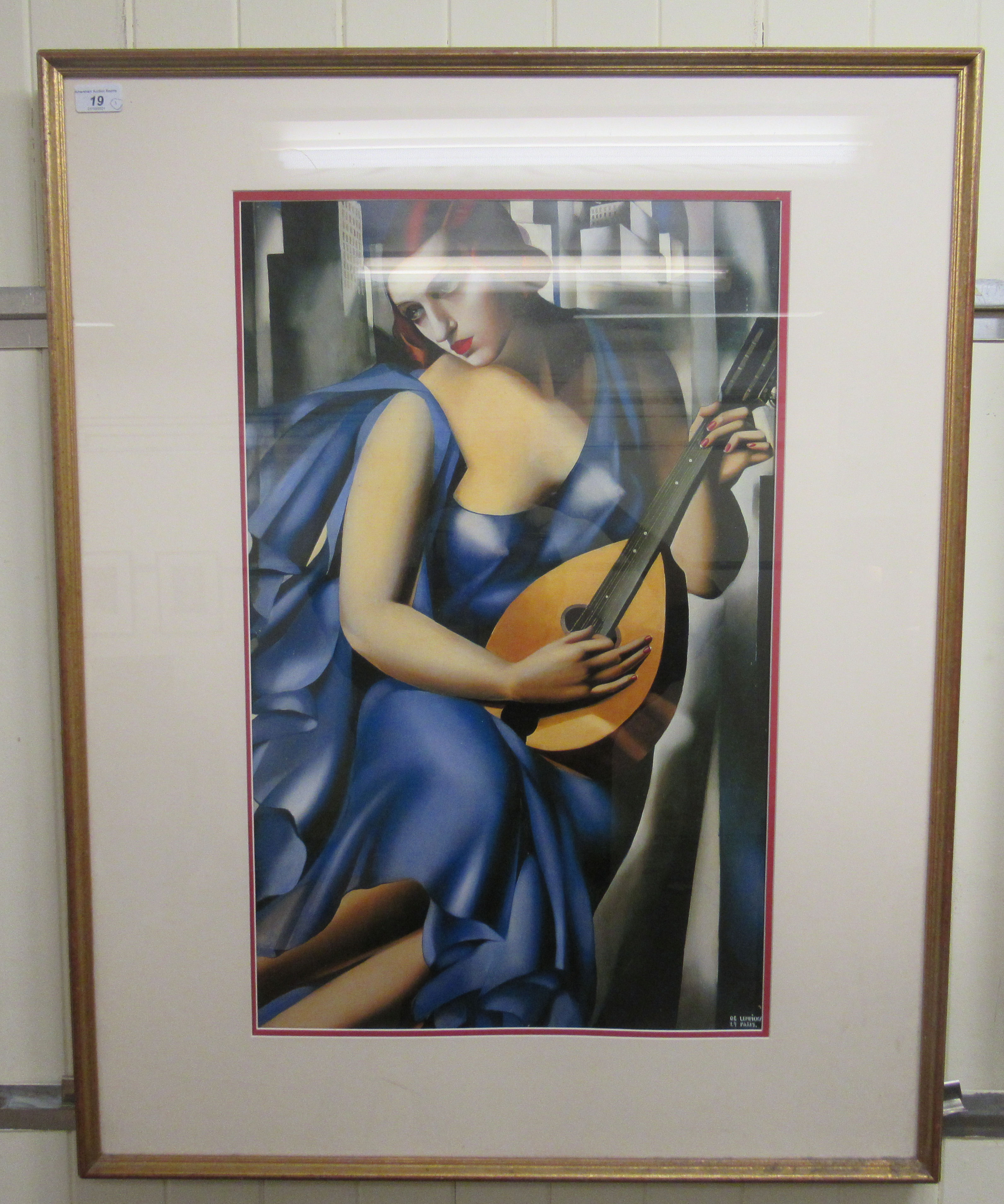 After De Lempicka - a woman playing a lute  coloured print  18" x 28" framed