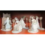 Five Lladro porcelain figures, each playing a different musical instrument  largest 11.25"h