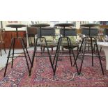 A set of four modern Atelier Haubmann German made bar stools with solid, turned and stained wooden