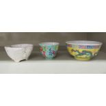Three items of early 20thC Chinese porcelain: to include a wine bowl, decorated with birds amongst