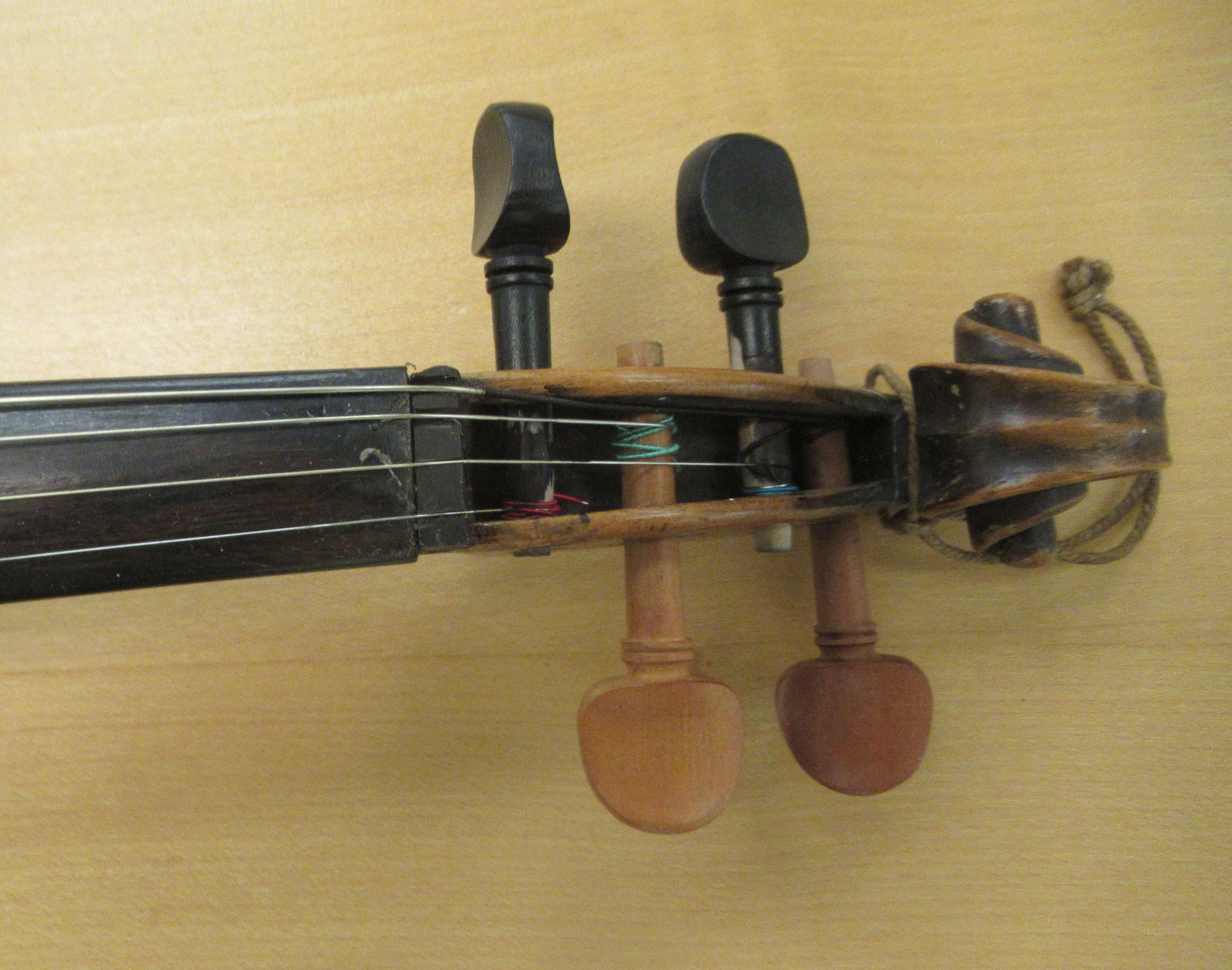 Three 19th/20thC violins, one with a one piece back  14"L; the others with two piece backs  13" - Image 11 of 16