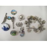 Silver and white metal jewellery: to include a white metal tennis racquet brooch; and an oval part