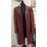 A gentleman's Moschino three quarter length, maroon hide coat with concealed buttons  size small