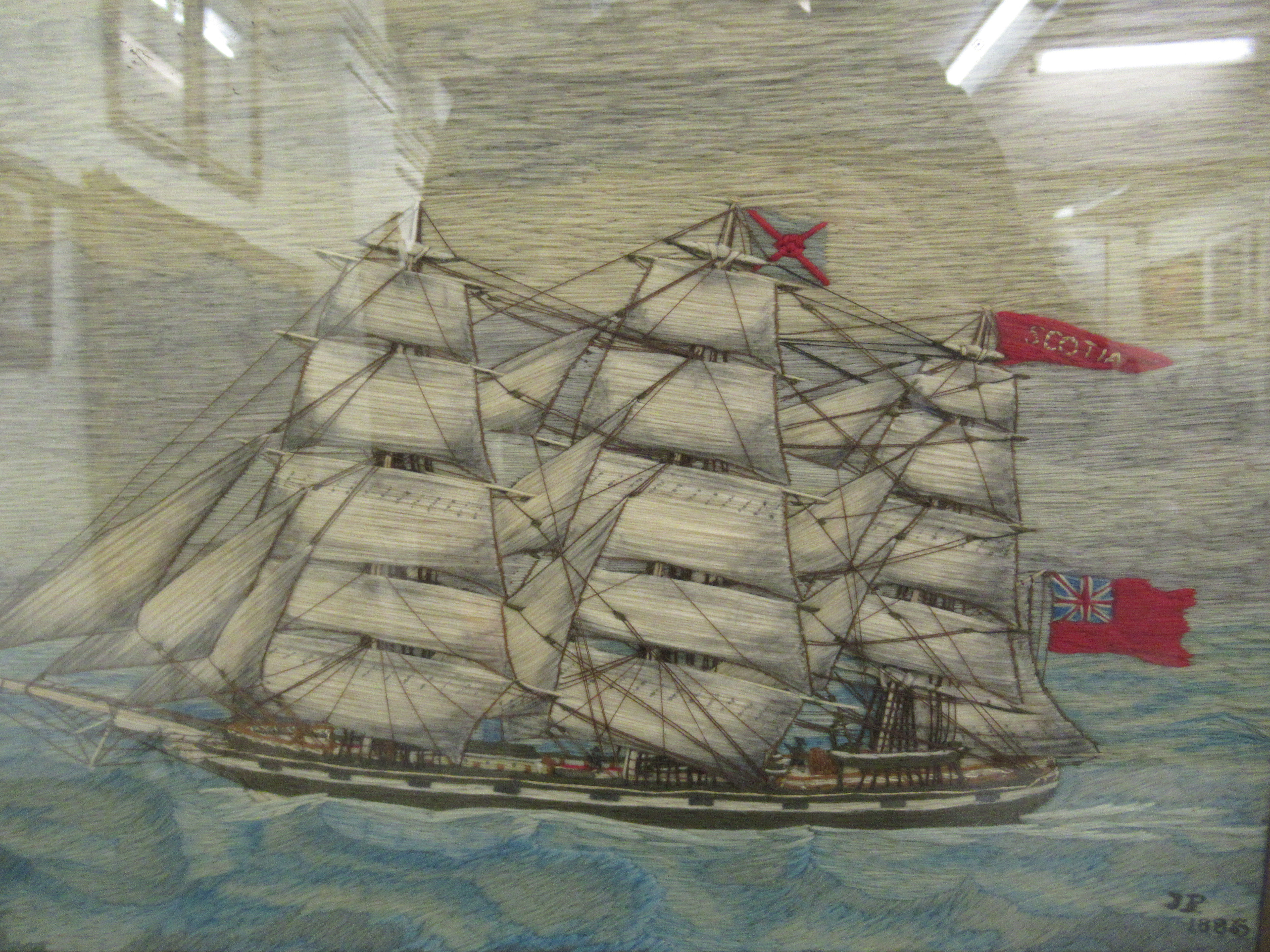 A late Victorian Merchant Navy sailor's woolwork picture, depicting a clipper, bearing three flags - Image 3 of 4