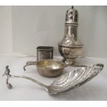 Silver, viz. a tea strainer; a box design salt cellar; a pedestal caster; and a Continental white