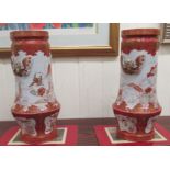 A pair of early 20thC Japanese porcelain vases, decorated in iron red and gilding with