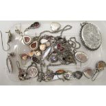 Silver/white metal items of personal ornament: to include earrings and a locket, on a fine neckchain