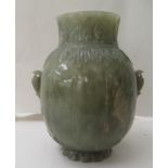 A Chinese carved green hardstone covered vase with lotus leaf designs  5"h