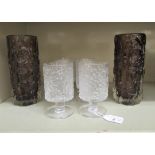 Whitefriars bark effect glassware, viz. a pair of brown and clear vases  7.75"h; and a set of six