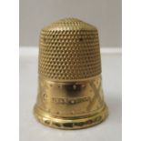 A 9ct gold thimble