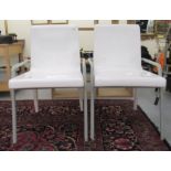 A pair of modern Tracey Boyd Resource Decor Eden design moulded ivory coloured plastic terrace