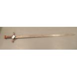 A 20thC Kaskara sword with a brown hide clad handle  the blade 35"L