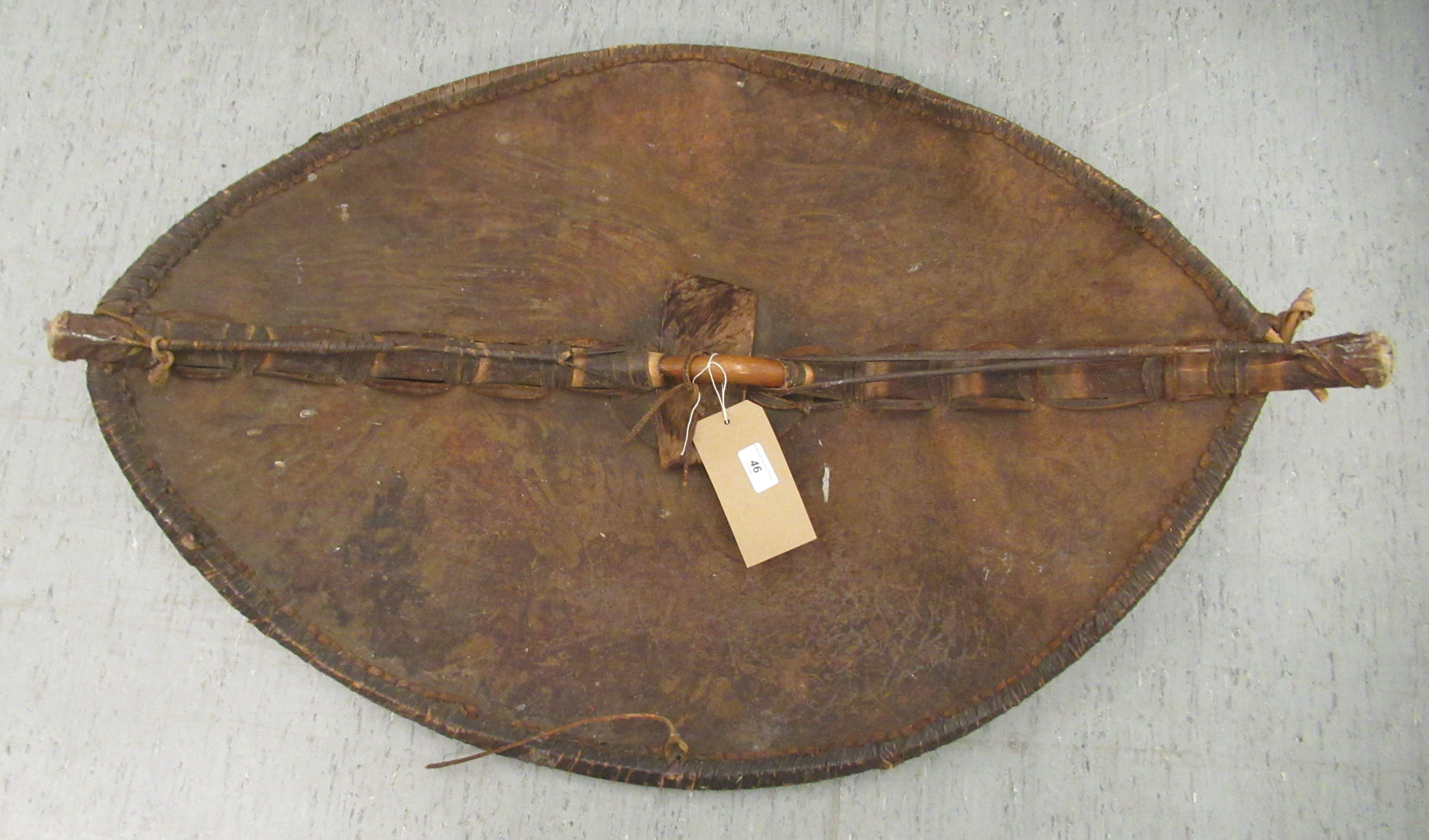 A 20thC Maasai shield painted with geometric patterns  39" x 27" - Image 2 of 4