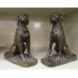 Two similar bronze finished models, seated hounds  9.25"h