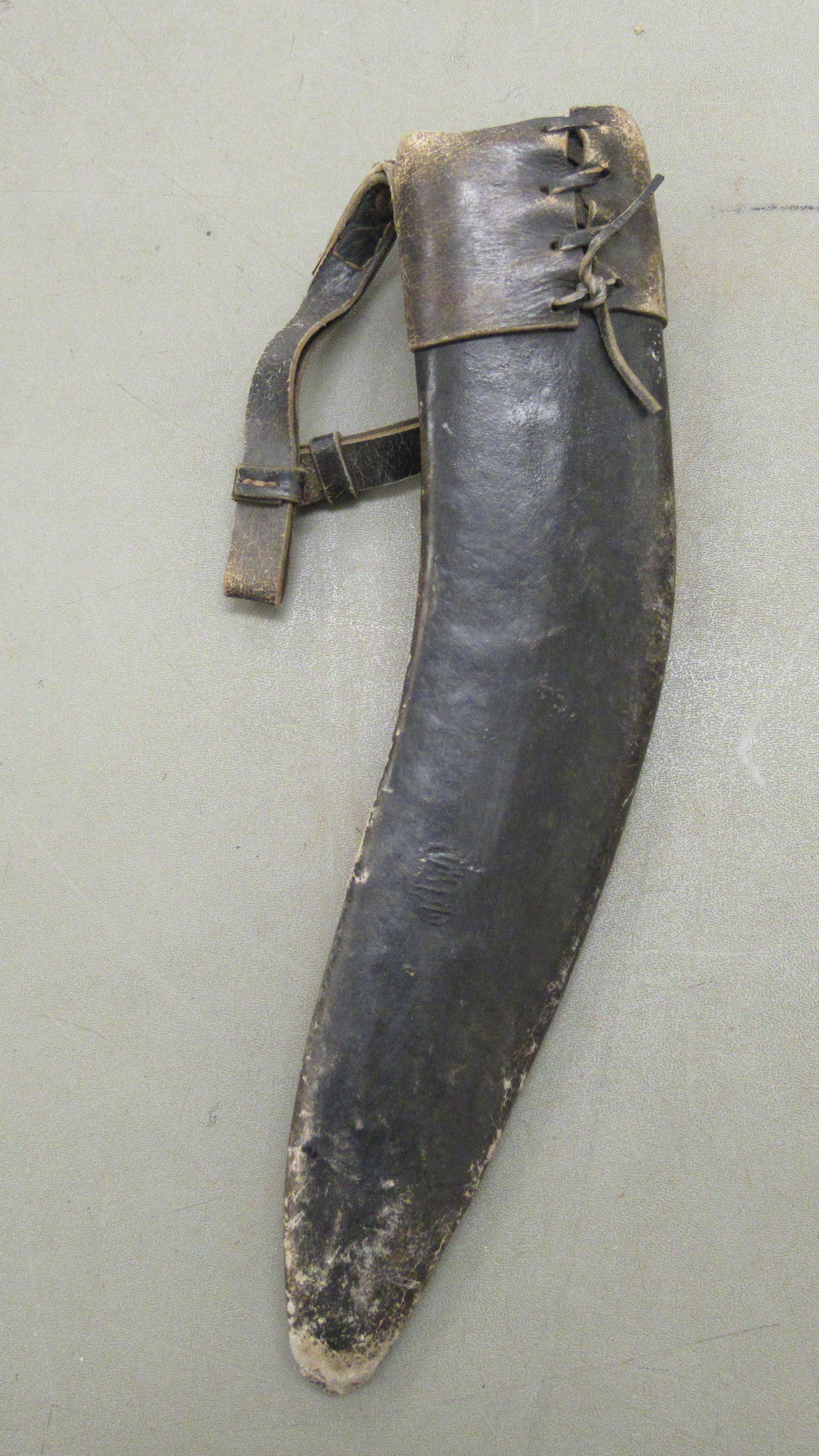 A 20thC Nepalese kukri on a, probably, horn handle  the blade 13"L, in a stitched hide sheath - Image 7 of 7