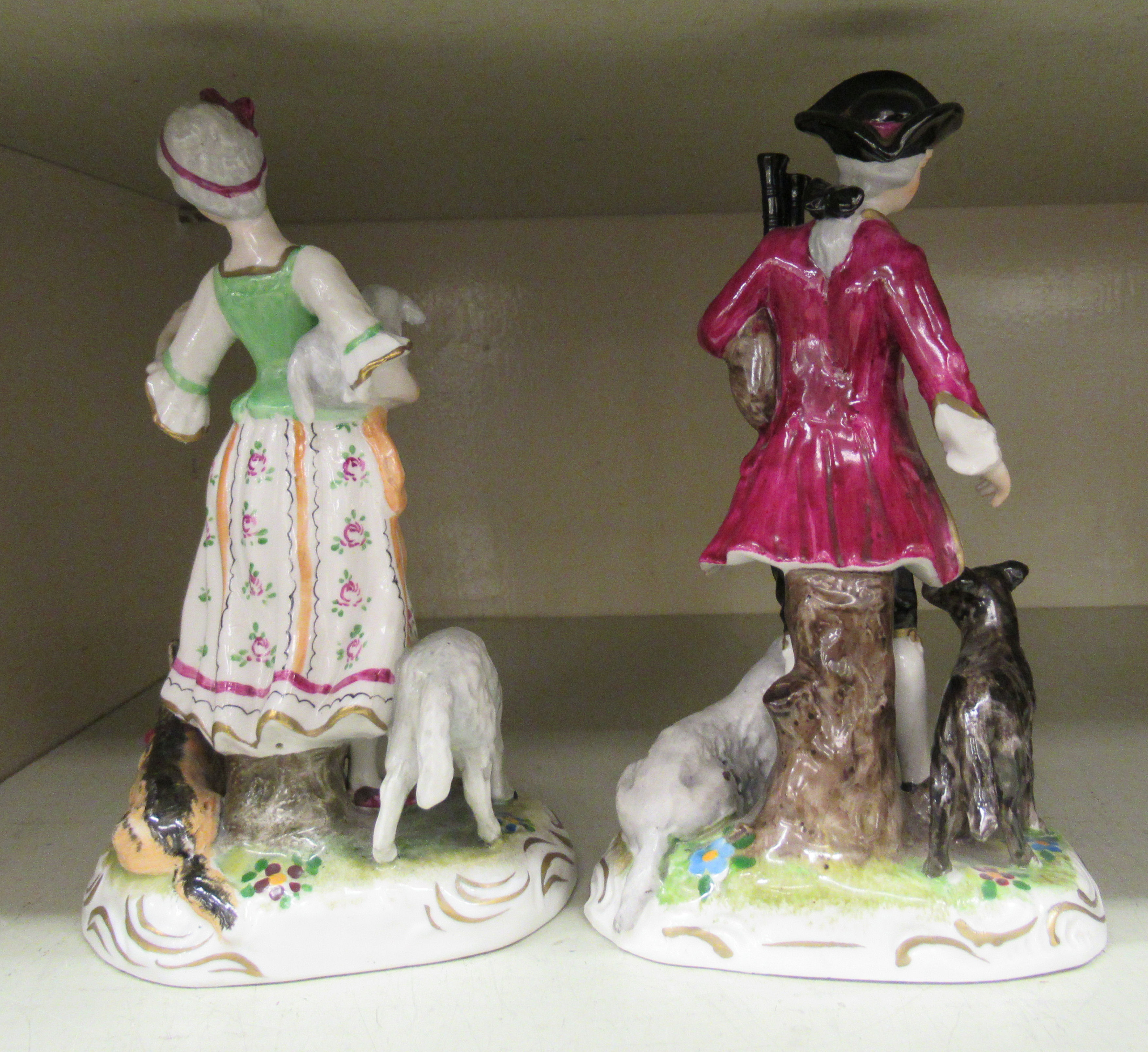 A pair of 20thC Wilhelm Rittirsch porcelain figures, viz. a young woman with a lamb, a sheep and a - Image 2 of 3