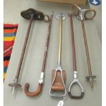 Five various shooting sticks: to include one with a stitched hide saddle seat