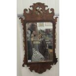A Regency design mirror, the rectangular plate set in a carved and gilded walnut frame  37" x 17"
