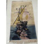 A (possibly) Chinese washed woollen rug, decorated with a galleon at sea  30" x 52"