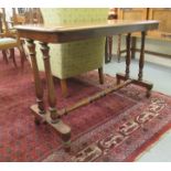 A mid 19thC mahogany centre table, the top with a thumb moulded edge, raised on opposing twin pillar