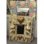 Two modern composition mirrors, one in 3D design with love hearts and cherubs  22" x 26" overall;