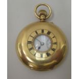 An 18ct gold cased half hunter pocket watch faced by a Roman dial with subsidiary seconds  inscribed