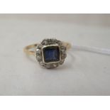 An 18ct gold sapphire and diamond cluster ring