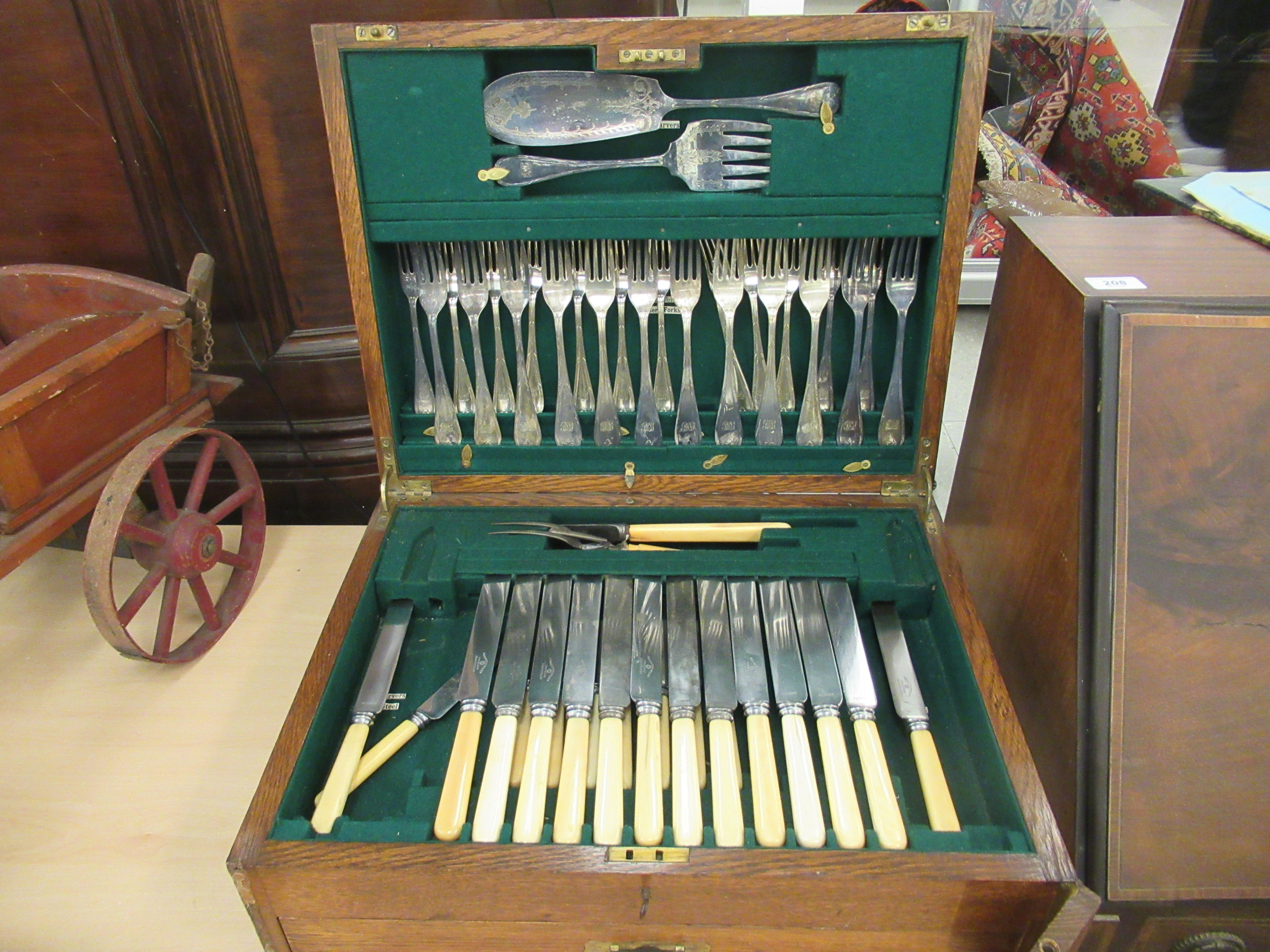 An1930s Mappin & Webb silver plated and stainless canteen of cutlery and flatware, in an oak, two - Image 4 of 5