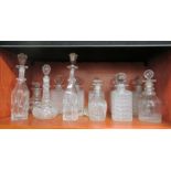 Clear lead crystal decanters: to include a set of three with hobnail cut decoration and stoppers